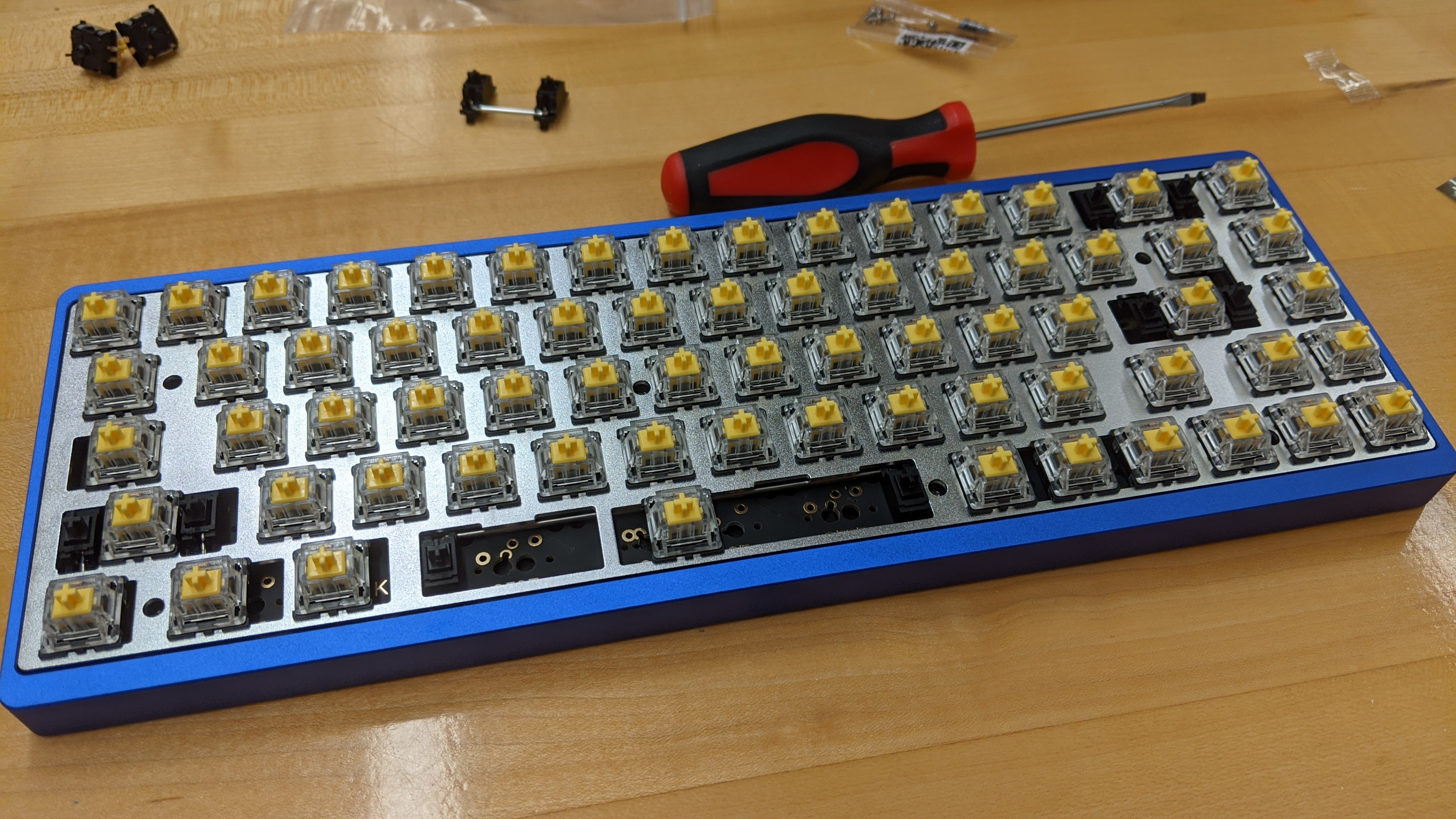 The assembled board, fit snugly into the case. The switches are still exposed.